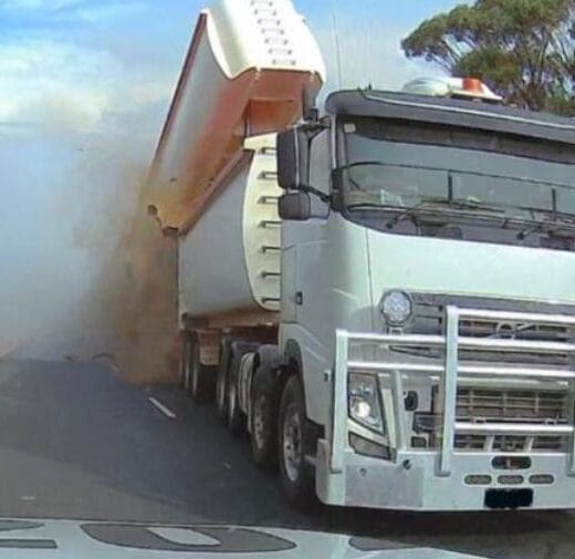 Trucks collide because smoke obscures vision.